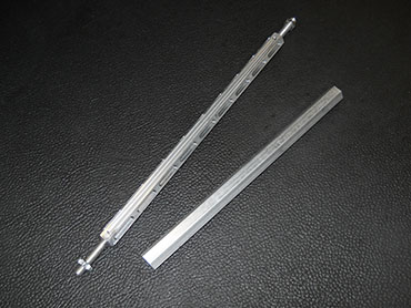 Custom Machined Shifter Linkage Before and After.JPG