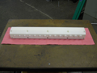 MACHINED PLASTIC DIE WITH MATCHING PLUGS (REAR VIEW).JPG